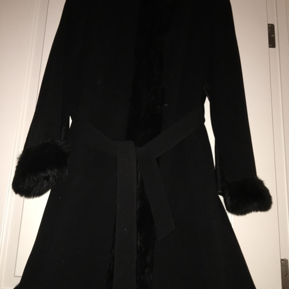 Black dress coat with faux fur trim.